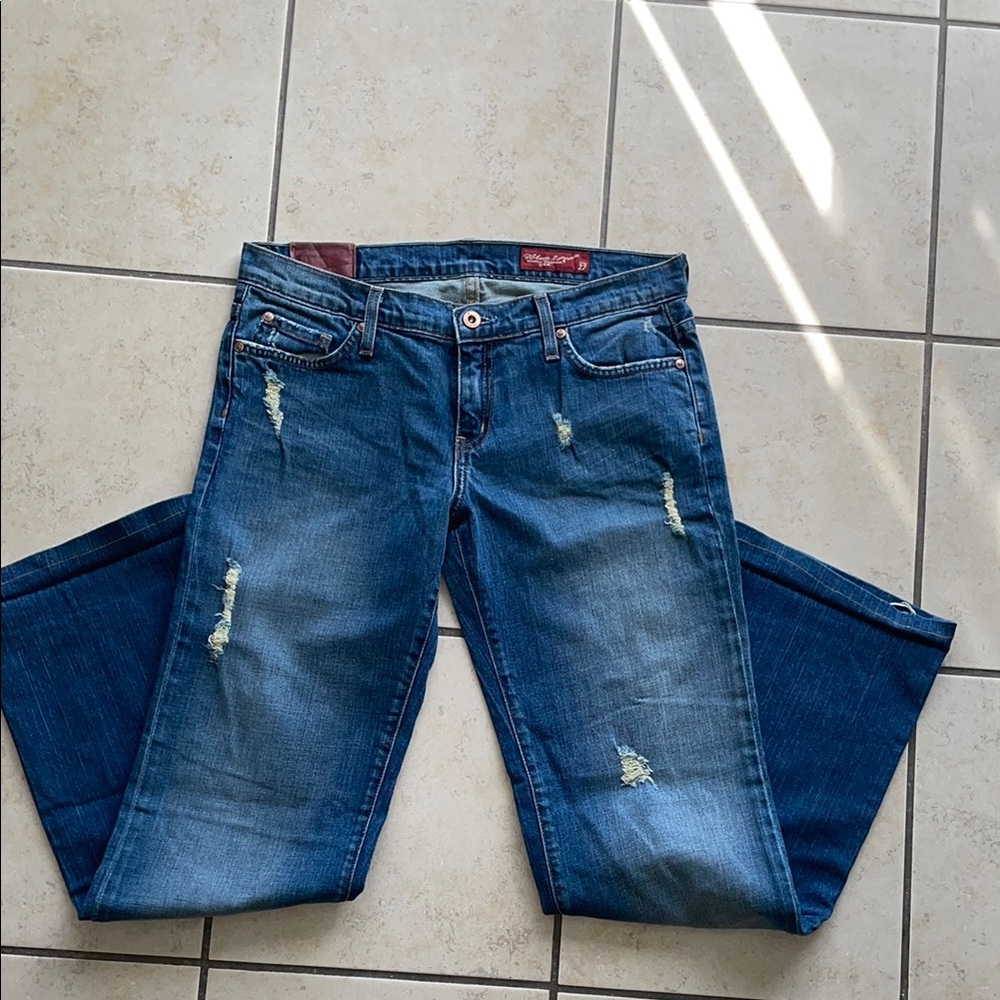 Woman Blue Distressed Jeans